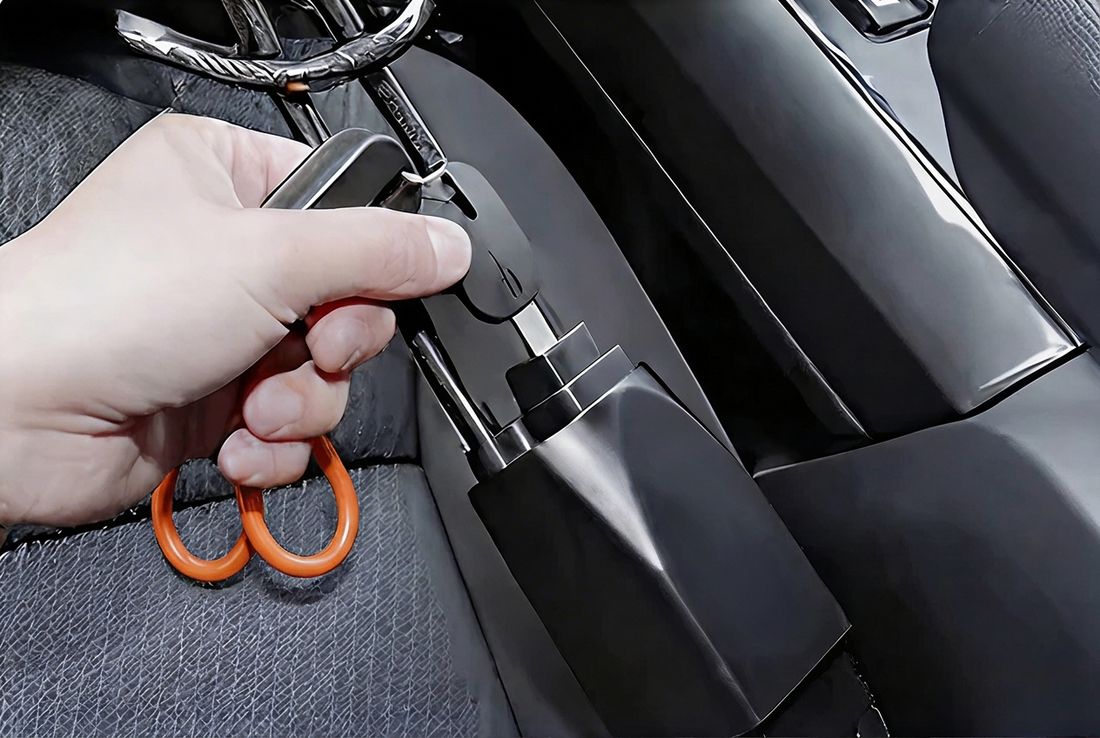 Driveway Defender locked from the steering wheel to the seatbelt buckle